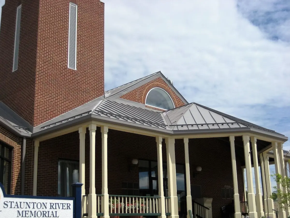 Skilled roofing craftsmen working on a residential roof in Morris Hill